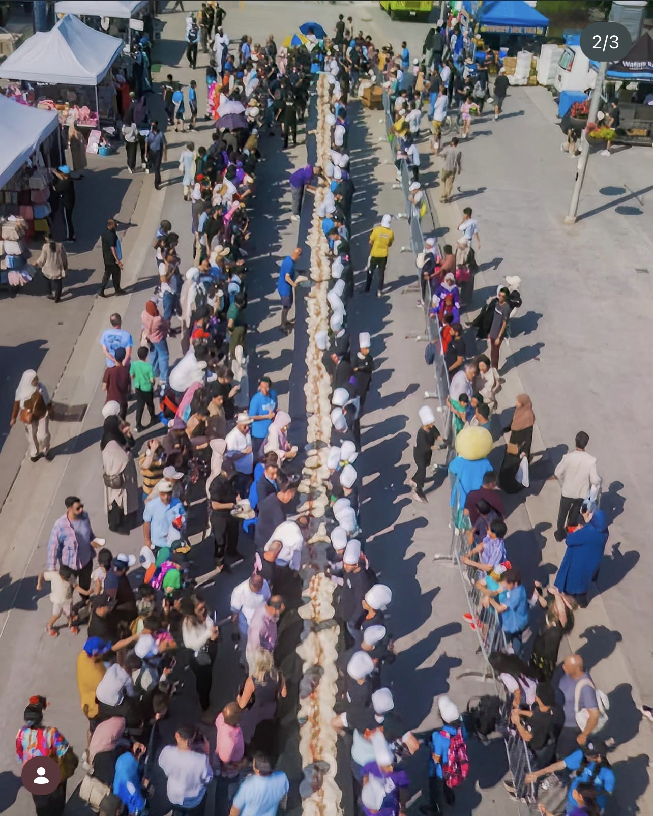 Aerial of the World's Longest Falafel Wrap stretching down a Mississauga street.