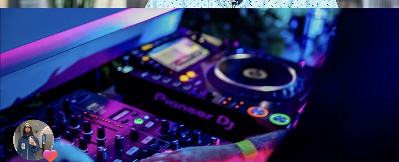 DJ booth with neon lighting.